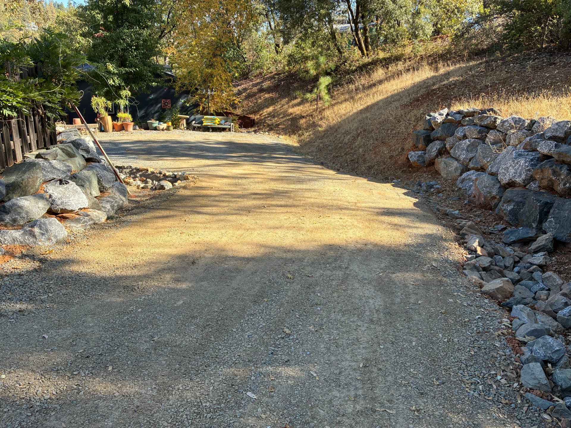 Gravel Driveway Rehab with Erosion Control and Concrete Stairway